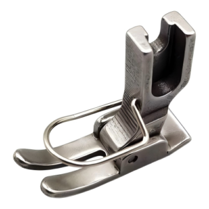 Close-up of the Juki OEM high-shank presser foot (part #B1524-012-0BA) with silver metal finish, shown alongside a compatible Juki industrial sewing machine for scale.